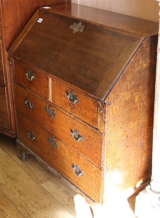 A small George III oak bureau, W.76cm